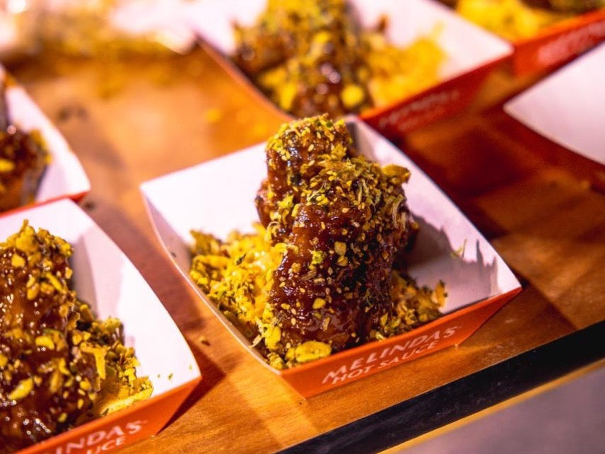 Crispy golden wings with furikake topping and kimchi coleslaw