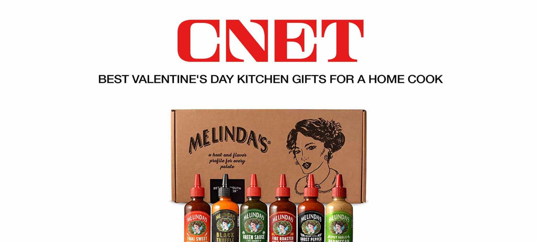 CNET logo above "Best Valentine's Day Kitchen Gifts for a Home Cook" with Melinda's hot sauce gift set featuring six bottles