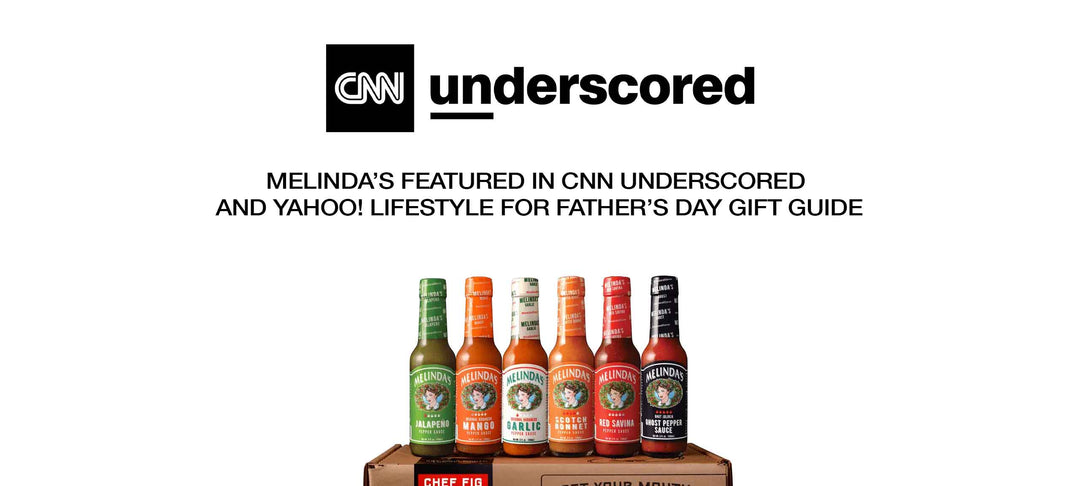 Six bottles of Melinda's hot sauce in various flavors displayed on wooden box with CNN Underscored logo above