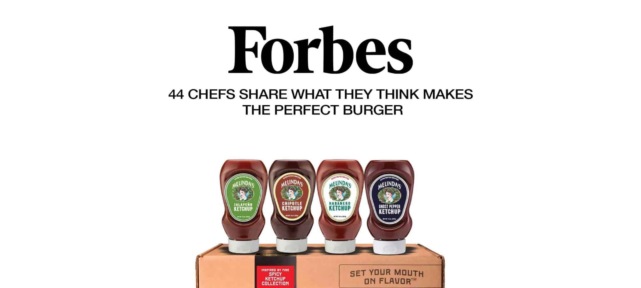 Four bottles of Melinda's ketchup varieties displayed on wooden box with Forbes headline about chefs' perfect burger tips