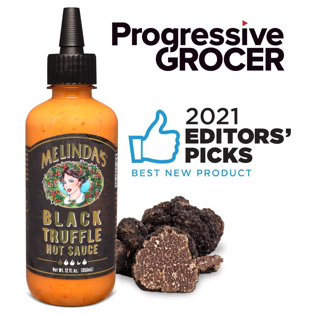 Melinda's Black Truffle Hot Sauce bottle with truffles, featuring Progressive Grocer 2021 Editor's Pick award badge