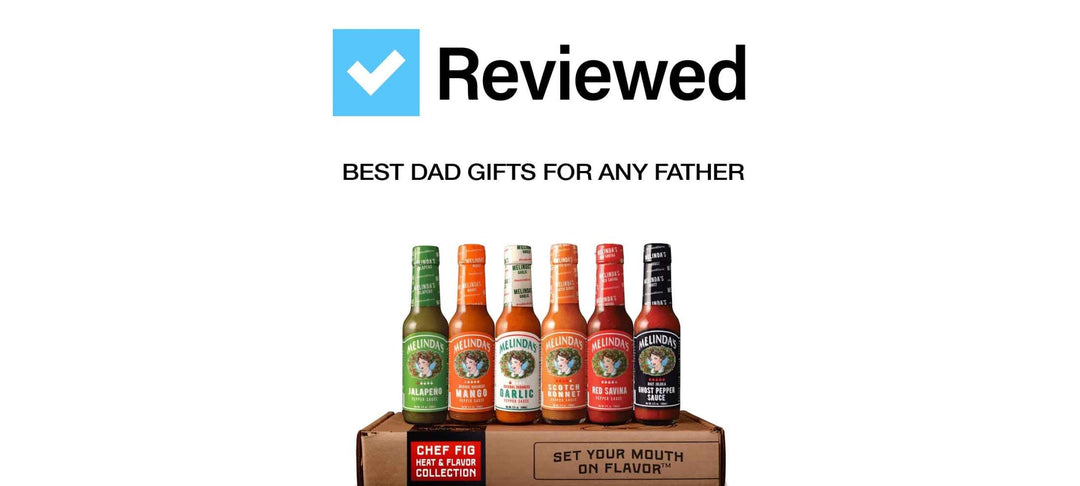 Six bottles of Melinda's hot sauce in different flavors displayed on wooden box, labeled as reviewed best dad gifts