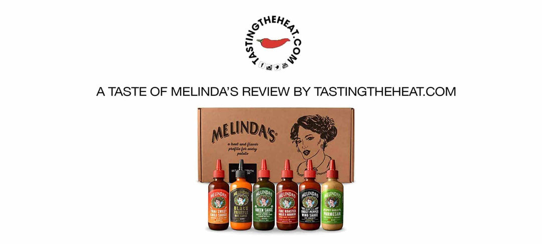 Hot sauce bottle collection from Melinda's brand with TastingTheHeat.com logo and review text above