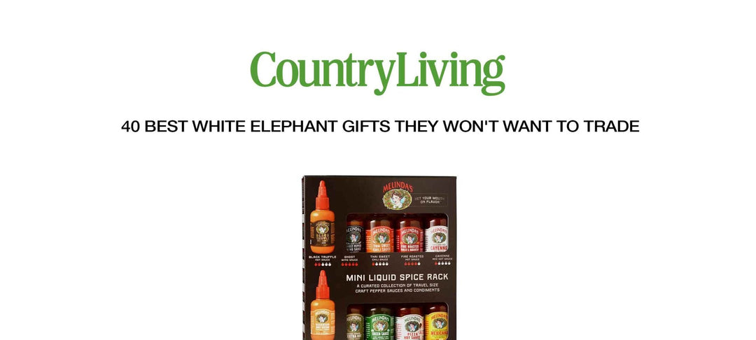 Mini liquid spice rack gift set with hot sauce bottles and spice containers in black packaging