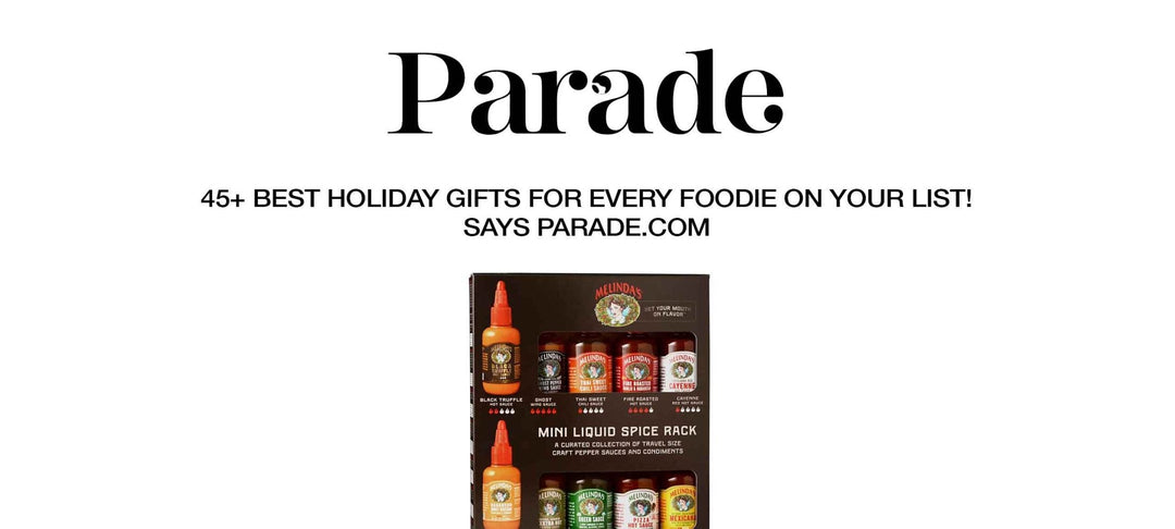 Mini liquid spice rack gift set with travel-size craft pepper sauces and condiments from Melinda's brand