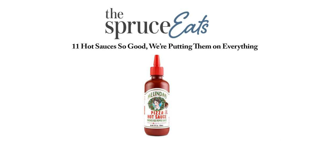 Melinda's Pizza Hot Sauce bottle with red squeeze cap and vintage-style label featuring fermented red pepper sauce