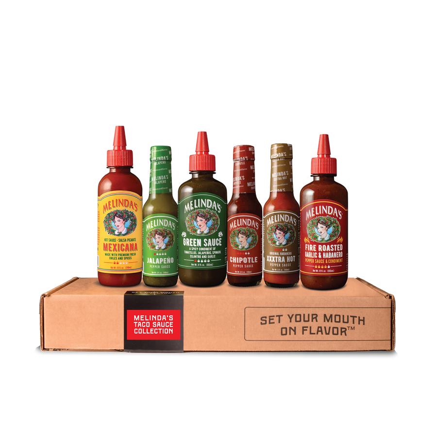 Melinda's Taco Sauce Collection gift box with six bottles: Mexicana 10 oz, Jalapeño 5 oz, Green Sauce 12 oz, Chipotle 5 oz, XXXtra Hot 5 oz, and Fire Roasted Garlic & Habanero 12 oz