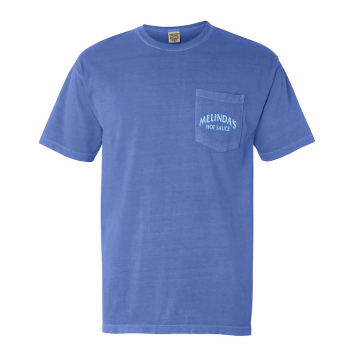 A Flo Blue Comfort Colors Pocket Tee by Melinda's Sauce with a blue logo on it.